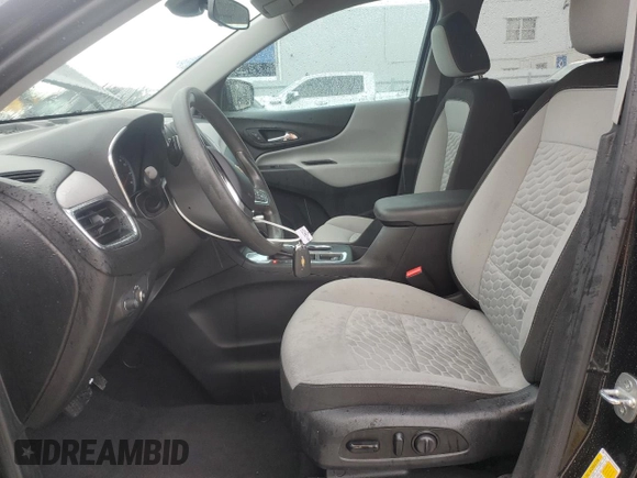 2020 Chevrolet Equinox LS z VIN 2GNAXHEV9L6232067, wystawiony jako Copart lot #59607985 z przebiegiem 66 101 mil mil oraz Szkoda całkowita • Salvage title. Historia ofert i sprzedaży dostępna na DreamBid. Obrazek 7.