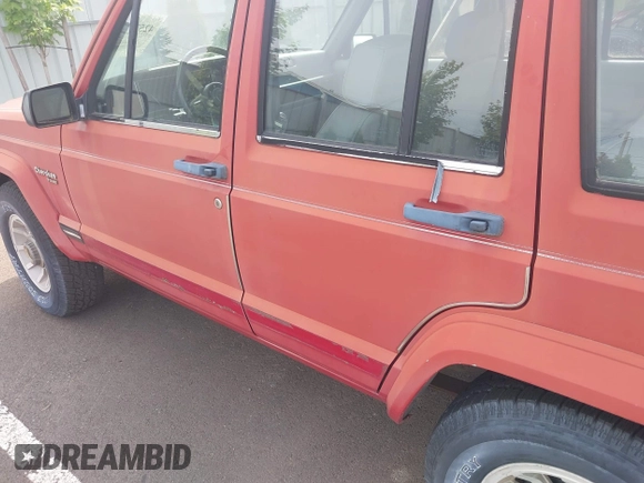 1989 Jeep Cherokee with VIN 1J4FT38L3KL577747, listed as a IAAI auction lot 42577047 with 144,312 mi miles and . Bid and sale history available at DreamBid. Image 6.