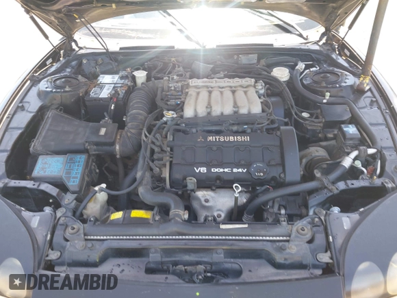 1995 Mitsubishi 3000GT GT z VIN JA3AM84J1SY026510, wystawiony jako IAAI lot #42298430 z przebiegiem 288 509 mil mil oraz . Historia ofert i sprzedaży dostępna na DreamBid. Obrazek 10.