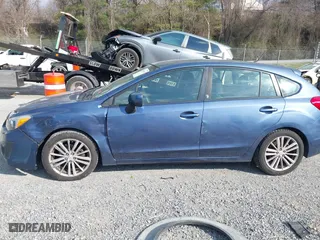 2012 Subaru Impreza Wagon 2.0i Premium with VIN JF1GPAD6XCH212222, listed as a IAAI auction lot 41899489 with 136,410 mi miles. Bid and sale history available at carsss.com. Image 14.