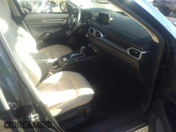 2020 Mazda CX-5 Touring with VIN JM3KFACM1L1817303, listed as a IAAI auction lot 41627859 with 57,268 mi miles. Bid and sale history available at carsss.com. Image 5.