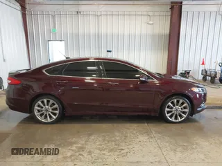 2017 Ford Fusion Titanium with VIN 3FA6P0K91HR171231, listed as a IAAI auction lot 41131312 with 115,265 mi miles. Bid and sale history available at carsss.com. Image 13.