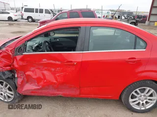 2012 Chevrolet Sonic LT with VIN 1G1JC5SH7C4133484, listed as a IAAI auction lot 42076809 with 100,506 mi miles and . Bid and sale history available at DreamBid. Image 14.
