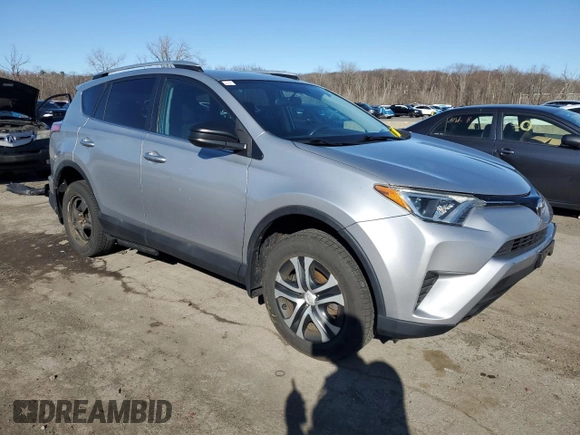 2016 Toyota RAV4 LE with VIN 2T3BFREV4GW451616, listed as a Copart auction lot 50143575 with 128,034 mi miles and Salvage Title. Bid and sale history available at DreamBid. Image 4.