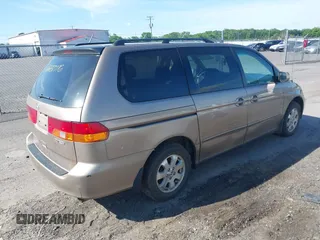 2003 Honda Odyssey EX z VIN 5FNRL18633B122838, wystawiony jako IAAI lot #42287776 z przebiegiem 130 544 mil mil oraz . Historia ofert i sprzedaży dostępna na DreamBid. Obrazek 4.