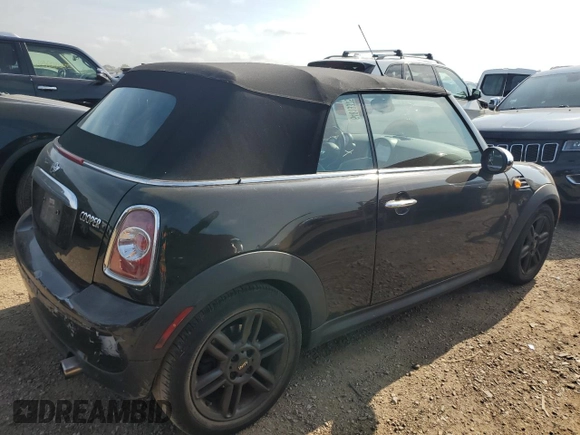 2011 MINI Convertible with VIN WMWZN3C57BT133547, listed as a Copart auction lot 64819375 with Not provided miles and Clean title. Bid and sale history available at DreamBid. Image 3.