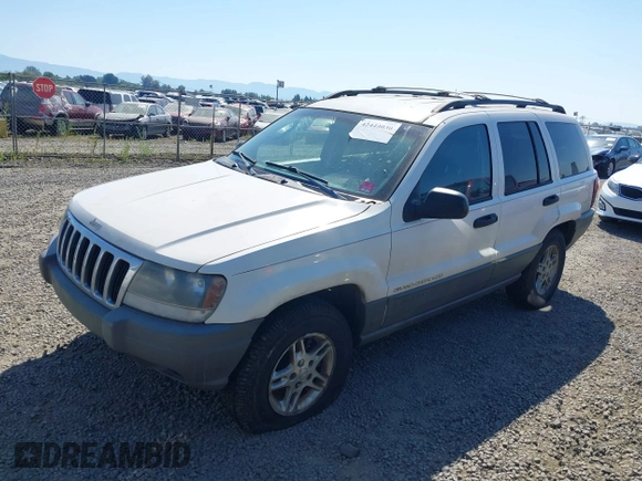 2002 Jeep Grand Cherokee Laredo with VIN 1J4GW48SX2C247709, listed as a IAAI auction lot 42444030 with 196,591 mi miles and . Bid and sale history available at DreamBid. Image 2.