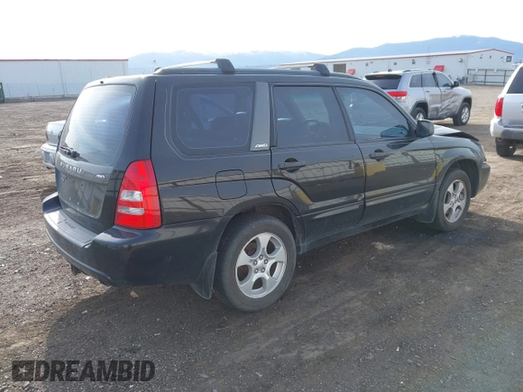 2003 Subaru Forester XS with VIN JF1SG65633H745258, listed as a IAAI auction lot 42014221 with 252,731 mi miles. Bid and sale history available at carsss.com. Image 4.