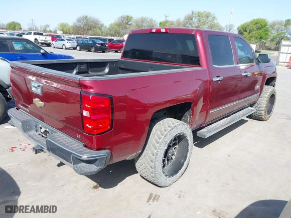 2014 Chevrolet Silverado 1500 LT with VIN 3GCPCRECXEG410417, listed as a IAAI auction lot 41854194 with 128,352 mi miles. Bid and sale history available at carsss.com. Image 4.