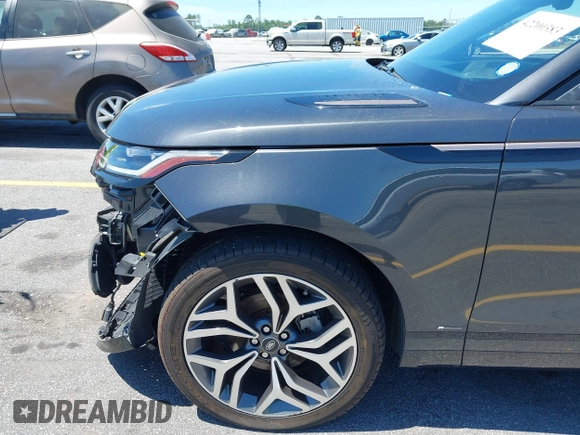 2020 Land Rover Range Rover Velar R-Dynamic S z VIN SALYK2EX5LA243809, wystawiony jako IAAI lot #42200383 z przebiegiem 66 381 mil mil oraz . Historia ofert i sprzedaży dostępna na DreamBid. Obrazek 21.