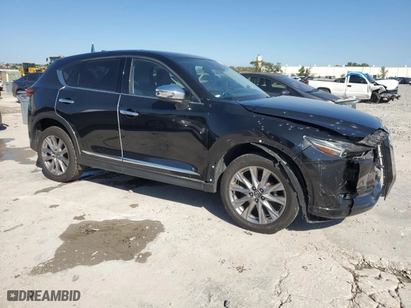 2020 Mazda CX-5 Grand Touring with VIN JM3KFADM7L0780990, listed as a Copart auction lot 48550845 with 85,942 mi miles and Salvage Title. Bid and sale history available at carsss.com. Image 4.