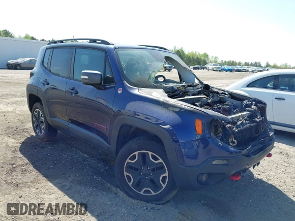2017 Jeep Renegade Deserthawk z VIN ZACCJBCBXHPE70318, wystawiony jako IAAI lot #41922391 z przebiegiem Nie podano mil oraz . Historia ofert i sprzedaży dostępna na DreamBid. Obrazek 1.