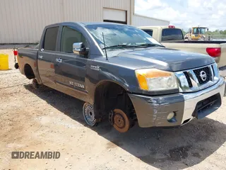 2012 Nissan Titan SL z VIN 1N6BA0ED9CN303168, wystawiony jako IAAI lot #42429337 z przebiegiem 185 103 mil mil oraz . Historia ofert i sprzedaży dostępna na DreamBid. Obrazek 1.