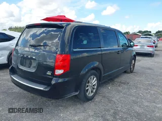 2019 Dodge Grand Caravan SXT with VIN 2C4RDGCG5KR797853, listed as a IAAI auction lot 40332854 with 81,197 mi miles and . Bid and sale history available at DreamBid. Image 4.