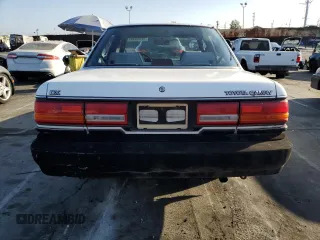 1990 Toyota Camry z VIN JT2SV21E3L0349179, wystawiony jako Copart lot #75125234 z przebiegiem 138 635 mil mil oraz Czysty tytuł • Clean title. Historia ofert i sprzedaży dostępna na DreamBid. Obrazek 6.