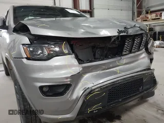 2018 Jeep Grand Cherokee Laredo E with VIN 1C4RJFAG6JC102969, listed as a IAAI auction lot 41963137 with 112,361 mi miles and . Bid and sale history available at DreamBid. Image 19.