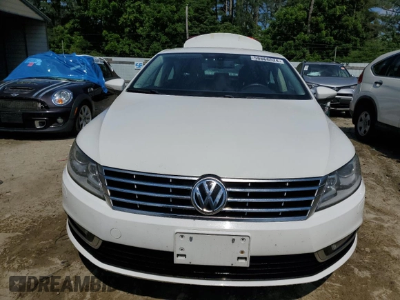 2013 Volkswagen CC R-Line with VIN WVWBP7AN1DE513242, listed as a Copart auction lot 58666524 with 53,460 mi miles and Salvage Title. Bid and sale history available at carsss.com. Image 5.