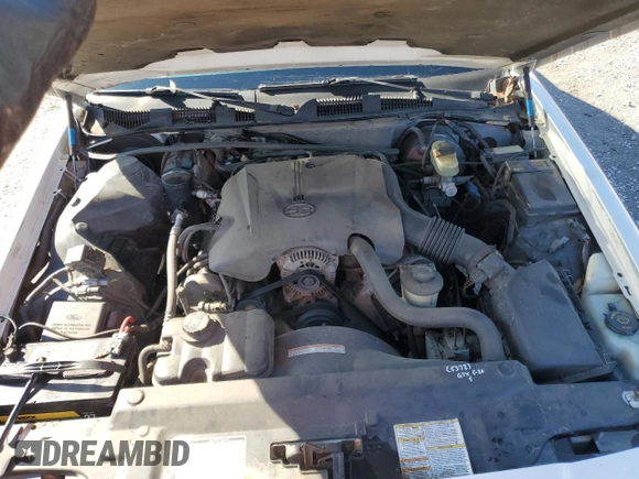 2000 Ford Crown Victoria LX z VIN 2FAFP74W0YX125595, wystawiony jako Copart lot #84675434 z przebiegiem 151 438 mil mil oraz Szkoda całkowita • Salvage title. Historia ofert i sprzedaży dostępna na DreamBid. Obrazek 12.