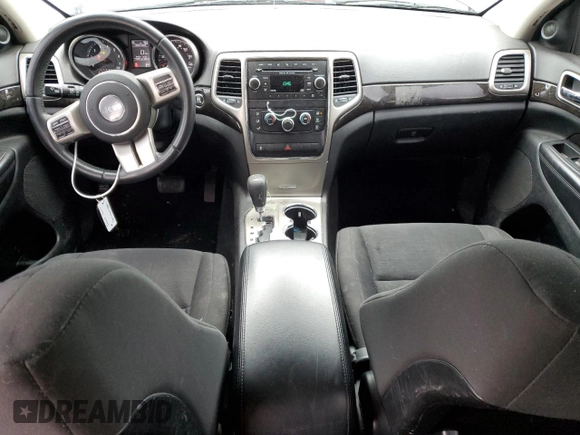 2013 Jeep Grand Cherokee Laredo with VIN 1C4RJFAG6DC630354, listed as a Copart auction lot 49773425 with 113,291 mi miles and Salvage Title. Bid and sale history available at carsss.com. Image 8.