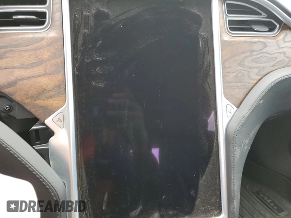 2017 Tesla Model S 100D with VIN 5YJSA1E21HF218273, listed as a Copart auction lot 55598075 with Not provided miles and Salvage title. Bid and sale history available at DreamBid. Image 9.
