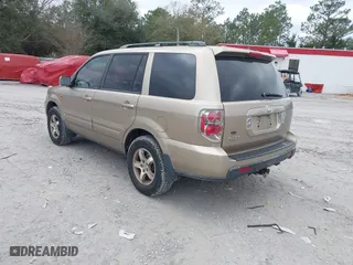 2006 Honda Pilot EX-L with VIN 5FNYF28566B010295, listed as a IAAI auction lot 41654433 with 302,539 mi miles. Bid and sale history available at carsss.com. Image 3.