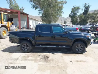 2023 Toyota Tacoma SR with VIN 3TMCZ5AN1PM654572, listed as a IAAI auction lot 42312575 with 14,111 mi miles and . Bid and sale history available at DreamBid. Image 13.