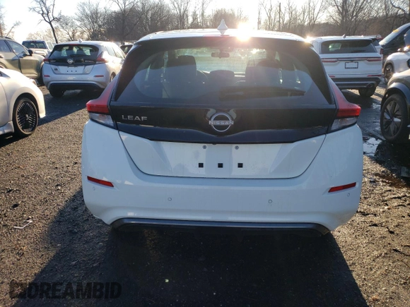 2024 Nissan LEAF S z VIN 1N4AZ1BV8RC556311, wystawiony jako Copart lot #85696754 z przebiegiem 1 279 mil mil oraz Szkoda całkowita • Salvage title. Historia ofert i sprzedaży dostępna na DreamBid. Obrazek 6.