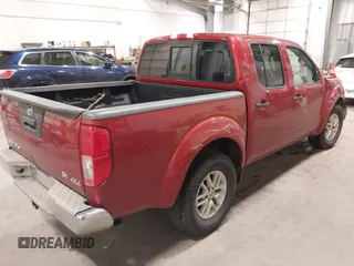2014 Nissan Frontier S with VIN 1N6AD0EV6EN708600, listed as a IAAI auction lot 42296112 with 112,737 mi miles and . Bid and sale history available at DreamBid. Image 4.