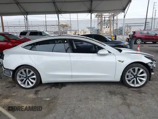 2020 Tesla Model 3 Long Range with VIN 5YJ3E1EB5LF801530, listed as a IAAI auction lot 41682050 with 65,743 mi miles. Bid and sale history available at carsss.com. Image 13.