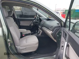 2016 Subaru Forester 2.5i Premium with VIN JF2SJADC0GH563577, listed as a IAAI auction lot 41694381 with 92,837 mi miles. Bid and sale history available at carsss.com. Image 5.