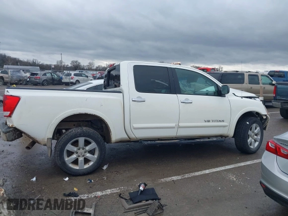 2012 Nissan Titan SL with VIN 1N6AA0EC7CN311109, listed as a IAAI auction lot 41420110 with 209,731 mi miles and . Bid and sale history available at DreamBid. Image 14.
