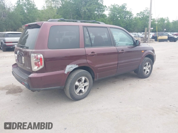2007 Honda Pilot EX-L with VIN 2HKYF18597H513543, listed as a IAAI auction lot 42509483 with 201,778 mi miles and . Bid and sale history available at DreamBid. Image 4.