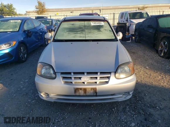 2004 Hyundai Accent GL with VIN KMHCG35C44U284868, listed as a Copart auction lot 74054884 with 87,259 mi miles and Clean Title. Bid and sale history available at carsss.com. Image 5.