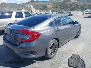 2016 Honda Civic Sedan LX with VIN 19XFC2F51GE034644, listed as a IAAI auction lot 41939884 with 59,433 mi miles. Bid and sale history available at carsss.com. Image 4.