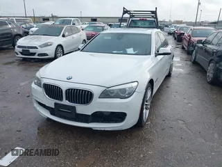 2015 BMW 7 Series 740Li with VIN WBAYE4C54FD947205, listed as a IAAI auction lot 41566291 with 172,729 mi miles and . Bid and sale history available at DreamBid. Image 2.