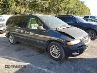 1999 Chrysler Town & Country LXi with VIN 1C4GP64L1XB599412, listed as a Copart auction lot 76901614 with Not Provided miles and Salvage Title. Bid and sale history available at carsss.com. Image 4.