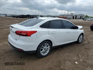 2016 Ford Focus SE с VIN 1FADP3F27GL222556, выставлен на аукционе Copart как лот 59638585 с пробегом 125 648 миль миль и Списание • Salvage title. История ставок и продаж доступна на DreamBid. Изображение 3.
