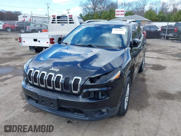 2014 Jeep Cherokee Latitude with VIN 1C4PJMCS6EW219999, listed as a IAAI auction lot 42044695 with 169,533 mi miles and . Bid and sale history available at carsss.com. Image 2.