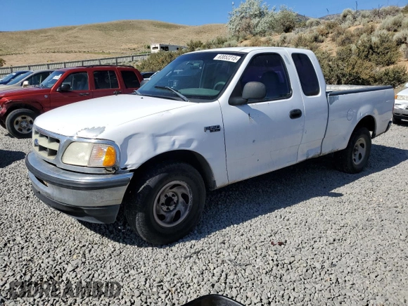 1998 Ford F-150 with VIN 1FTZX1720WKA20813, listed as a Copart auction lot 63852215 with 215,729 mi miles and Salvage title. Bid and sale history available at DreamBid. Image 1.