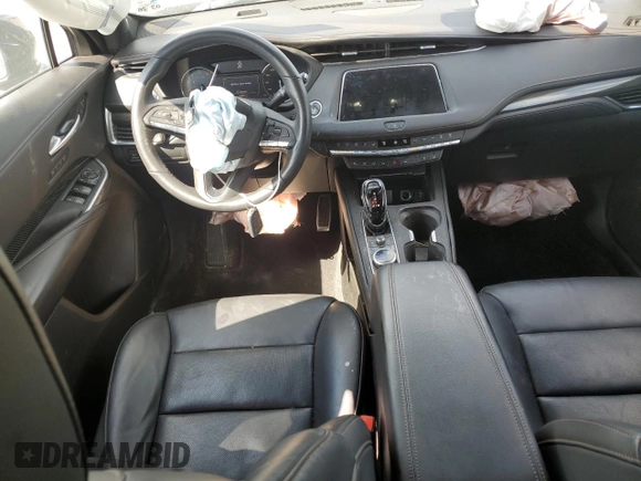 2022 Cadillac XT4 FWD Sport with VIN 1GYFZER46NF119009, listed as a Copart auction lot 57651725 with 37,896 mi miles and Salvage title. Bid and sale history available at DreamBid. Image 8.