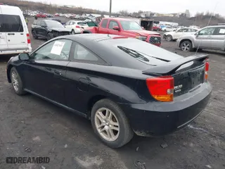 2001 Toyota Celica GT with VIN JTDDR32T510102122, listed as a IAAI auction lot 42027693 with 154,342 mi miles. Bid and sale history available at carsss.com. Image 3.