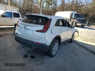 2021 Cadillac XT4 FWD Luxury с VIN 1GYAZAR47MF023407, выставлен на аукционе Copart как лот 88633325 с пробегом 77 353 миль миль и Списание • Salvage title. История ставок и продаж доступна на DreamBid. Изображение 3.