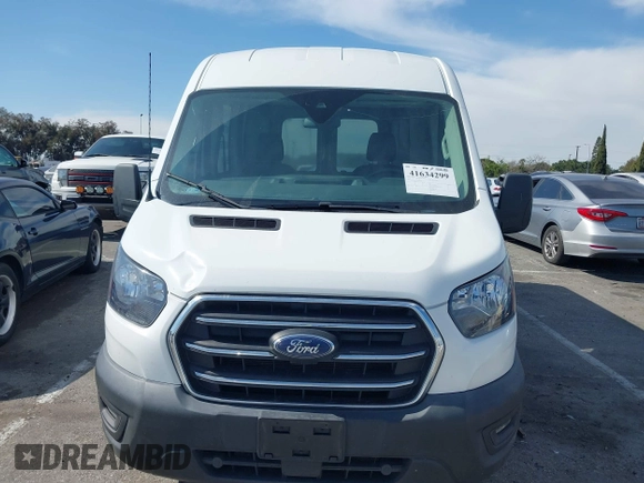 2020 Ford Transit Cargo z VIN 1FTBR1C83LKB11124, wystawiony jako IAAI lot #41634299 z przebiegiem 80 802 mil mil oraz . Historia ofert i sprzedaży dostępna na DreamBid. Obrazek 12.