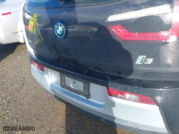 2014 BMW i3 with VIN WBY1Z4C54EV275808, listed as a IAAI auction lot 41659125 with NaN miles. Bid and sale history available at carsss.com. Image 6.