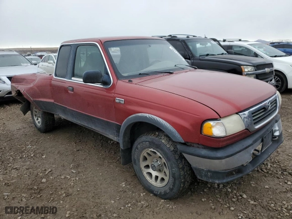 2000 Mazda B-Series 4WD Truck SE with VIN 4F4ZR17X5YTM16777, listed as a Copart auction lot 45692135 with 202,047 mi miles and Salvage Title. Bid and sale history available at carsss.com. Image 4.