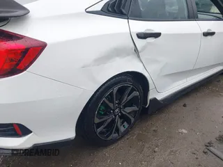 2019 Honda Civic Sport with VIN 2HGFC2F80KH605100, listed as a IAAI auction lot 41825640 with 82,363 mi miles and . Bid and sale history available at DreamBid. Image 6.