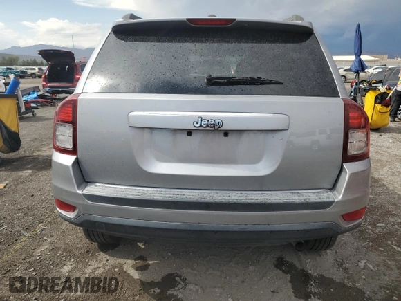 2016 Jeep Compass Sport with VIN 1C4NJCBA5GD612112, listed as a Copart auction lot 60039395 with 154,860 mi miles and Salvage title. Bid and sale history available at DreamBid. Image 6.