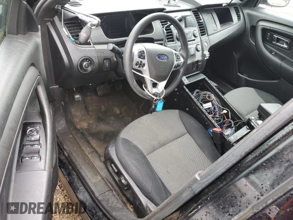 2014 Ford Police Interceptor with VIN 1FAHP2MT9EG111729, listed as a Copart auction lot 56947315 with 74,887 mi miles and Salvage title. Bid and sale history available at DreamBid. Image 8.