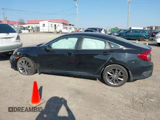 2019 Honda Civic EX-L z VIN 19XFC1F7XKE011397, wystawiony jako IAAI lot #41784014 z przebiegiem 85 938 mil mil oraz . Historia ofert i sprzedaży dostępna na DreamBid. Obrazek 14.