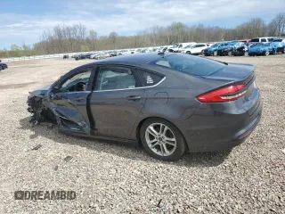 2018 Ford Fusion SE z VIN 3FA6P0H78JR108395, wystawiony jako Copart lot #55308795 z przebiegiem Nie podano mil oraz Szkoda całkowita • Salvage title. Historia ofert i sprzedaży dostępna na DreamBid. Obrazek 2.